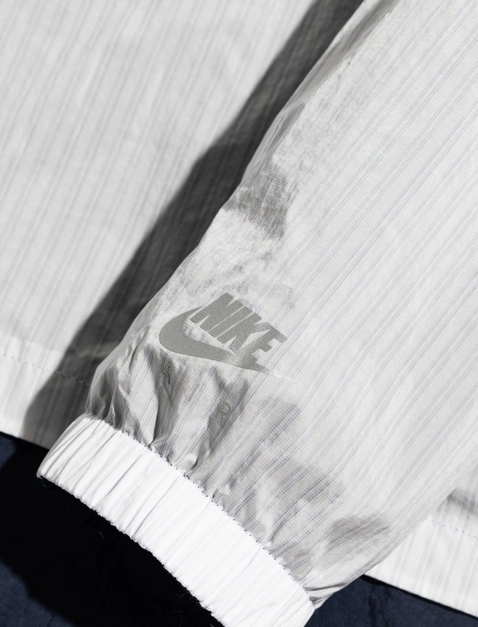 KIM JONES REVERSIBLE WINDBREAKER